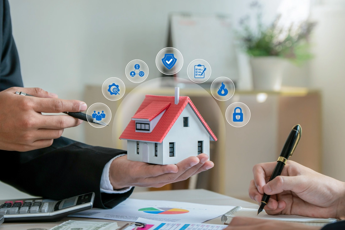 Real estate discussion with house model